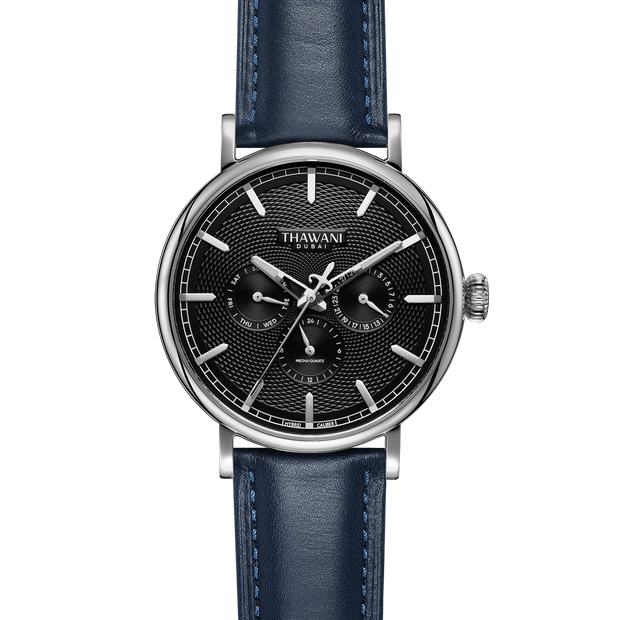 silver watch with black dial and blue strap