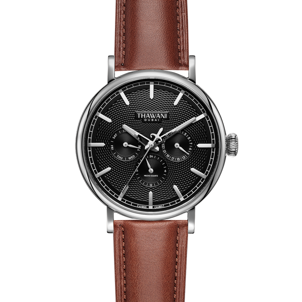 silver watch with black dial and brown strap